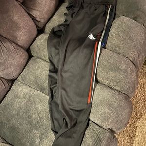 Adidas joggers.  Size small. Red,white and blue stripe. Zip bottoms